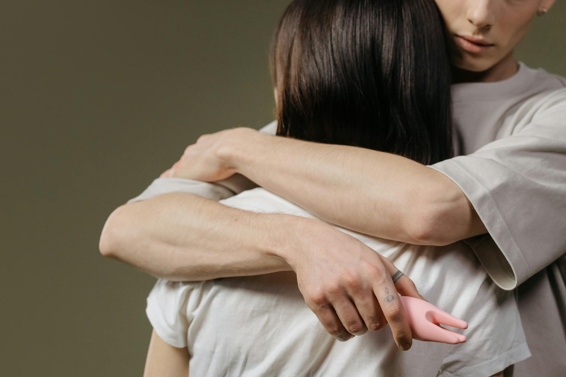 A couple embracing with tenderness and emotional connection after a significant life event